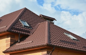 A rooftop with clay tile shingles