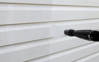 Using a pressure washer on vinyl siding