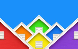 collection of houses with colorful siding