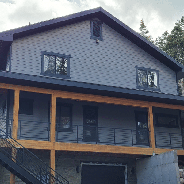 Modern Utah-style home with wood-look siding installed by a siding contractor