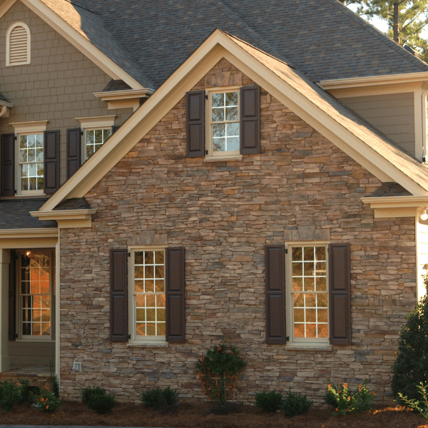 Damaged Exterior Wall From Deferred Maintenance Cracked and weathered exterior wall showing damage from neglect
