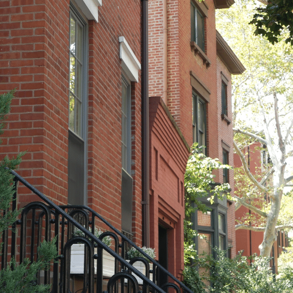 Damaged Exterior Brick Needing Repair Close up of cracked and weathered exterior brick showing signs of damage on a home
