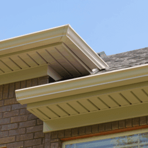 Ventilated soffit panels installed under home roof eaves